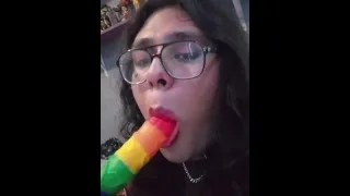 Trans girl sucks on dildo