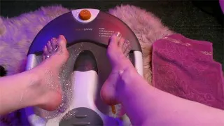 teen femboy washes her smooth legs in a massage bath and smears them with cream